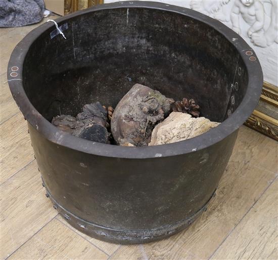 A copper cylindrical studded log cauldron, diameter 22in.